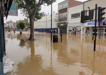 WOOD Green High Street di London yang dilanda banjir akibat hujan lebat. - PETER WILSON