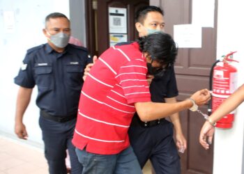 SEORANG buruh didakwa atas pertuduhan mencabul kanak-kanak perempuan berusia empat tahun minggu lalu di Mahkamah Sesyen Ipoh hari ini.  - UTUSAN/ZULFACHRI ZULKIFLI