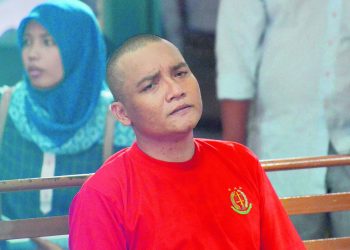 Khaireyll Benjamin Ibrahim, alias Benjy, attends his trial at a court in Medan on October 18, 2017. 

An Indonesian court on October 18 sentenced Malaysian actor Khaireyll Benjamin Ibrahim to 11 years in jail for possession of 5 grams of methamphetamine. / AFP PHOTO / GATHA GINTING