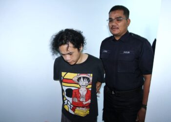 ZAHRUL Ashrik Zulkaflee didakwa membunuh bayi lelakinya pada 17 Mac lalu dihadapkan di Mahkamah Majistret  Ipoh hari ini. - UTUSAN/MUHAMAD NAZREEN SYAH MUSTHAFA