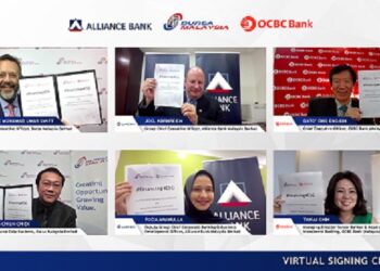 Majlis menandatangani kerjasama antara Bursa Malaysia, Alliance Bank dan OCBC Bank di Kuala Lumpur, semalam.