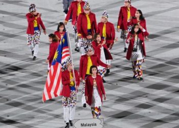 Atlet Malaysia memasuki Stadium Olimpik di Tokyo ketika acara pembukaan Olimpik Tokyo 2021 lalu. - AFP