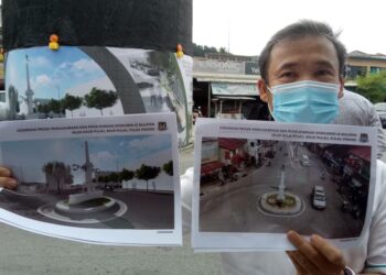 YEW Tung Seang menunjukkan monumen warisan di bulatan Jalan Balik Pulau, Pulau Pinang yang sedang menjalani proses pemeliharaan dan pemuliharaan.
Monumen warisan di bulatan Jalan Balik Pulau, Pulau Pinang yang sedang menjalani proses pemeliharaan dan pemuliharaan dijangka siap dalam tempoh lima bulan lagi.. -UTUSAN/SAFINA RAMLI