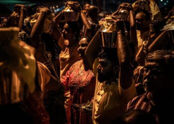 Malaysian Hindu devotees perform prayers during Thaipusam on February 08, 2020 in Selangor, Malaysia. Thaipusam is a Hindu festival celebrated mostly by the Tamil community. Devotees will pray and make vows by piercing parts of their body such as their cheeks, tongues, and backs before carrying a ‘Kavadi’ or milk pots on a four kilometre journey of faith. The Malaysian Reserve - Arif Kartono