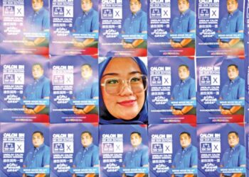 Ahli Jawatankuasa Puteri UMNO Bahagian Putatan, Suzieyana Mohamad Sha mempromosikan calon Barisan Nasional (BN) Duyong, Mohd Noor Helmy Abdul Halem, semalam. – UTUSAN/RASUL AZLI SAMAD