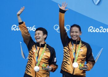 MALAYSIA pernah meraih pingat perak menerusi gandingan Jun Hoong (kiri) dan Pandelela dalam acara 10m terjun seirama di Olimpik 2016 Rio.