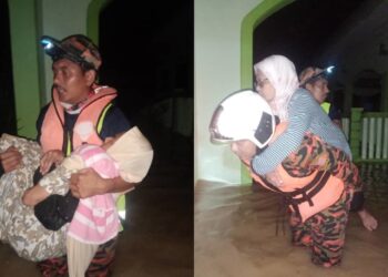 ANGGOTA bomba menyelamatkan sebahagian warga emas yang merupakan penghuni Kompleks Pengajian Darul Widad di Permatang Pasir, Linggi, Port Dickson dalam kejadian banjir malam tadi.