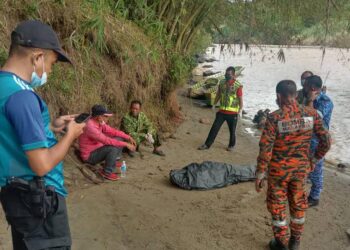 MANGSA hilang ditemukan lemas di Sungai Ulu Sugut Karagasan, Ranau semalam. - IHSAN BOMBA