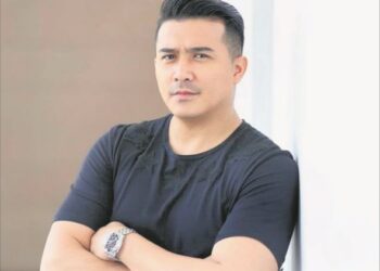 AARON AZIZ