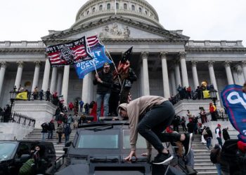 PENYOKONG Trump melanggar sekatan keselamatan di bangunan Capitol, Washington, Amerika Syarikat. - AFP