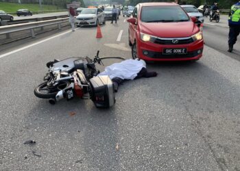 KEADAAN mangsa maut di lokasi kejadian di Kilometer (KM) 1.9 SKVE hala Kajang.