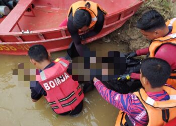 MAYAT Muhammad Ikram ditemukan selepas dilaporkan hilang ketika keluar memancing berdekatan jambatan Mempatih di Lanchang, Temerloh, Pahang. - FOTO IHSAN JBPM PAHANG