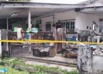 RUMAH yang menjadi tempat tinggal mangsa dan suspek di Taman Kerian, Parit Buntar, Perak.