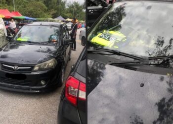 GAMBAR tular kereta Proton Saga dengan vest polis diletakkan di papan pemuka yang didakwa menghalang lalu lintas di Persiaran Brash di Ipoh. - UTUSAN