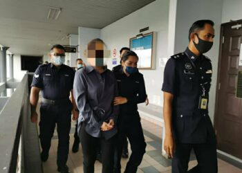 Loo Mei Lin dibenarkan diikat jamin RM50,000 selepas didakwa mengikut Subseksyen 4 (1) (b) Akta Pencegahan Pengubahan Wang Haram di Mahkamah Sesyen Melaka, hari ini. - UTUSAN/DIYANATUL ATIQAH ZAKARYA