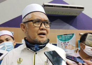 RAZMAN Zakaria ditemui pemberita pada Program Menteri Besar Bersama Rakyat di Bagan Seri hari ini. - UTUSAN/WAT KAMAL ABAS